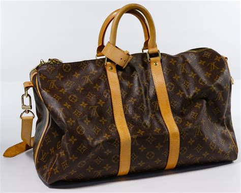 cost of louis vuitton duffle bag|louis vuitton duffle bag suitcase.